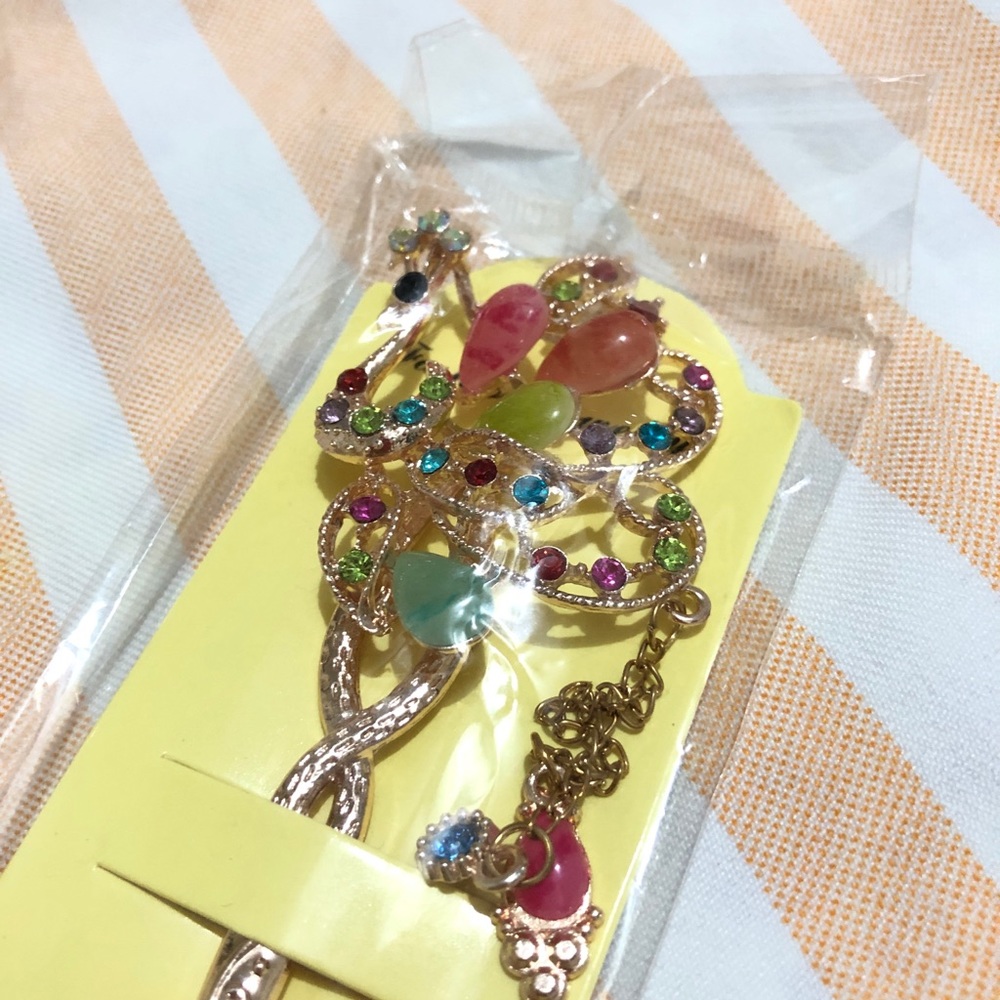 Peacock hair hat pin